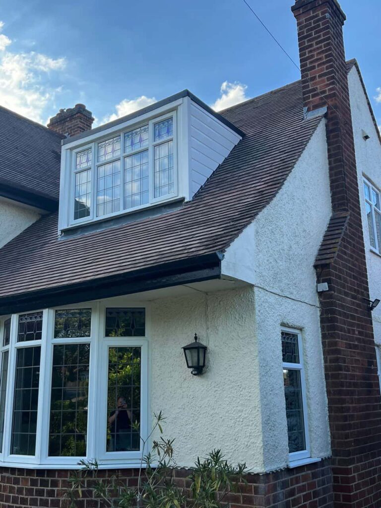 This is a photo of a dormer window which has just had some repairs carried out where the roof and the dormer meet. Works carried out by Tuxford Roofing Repairs